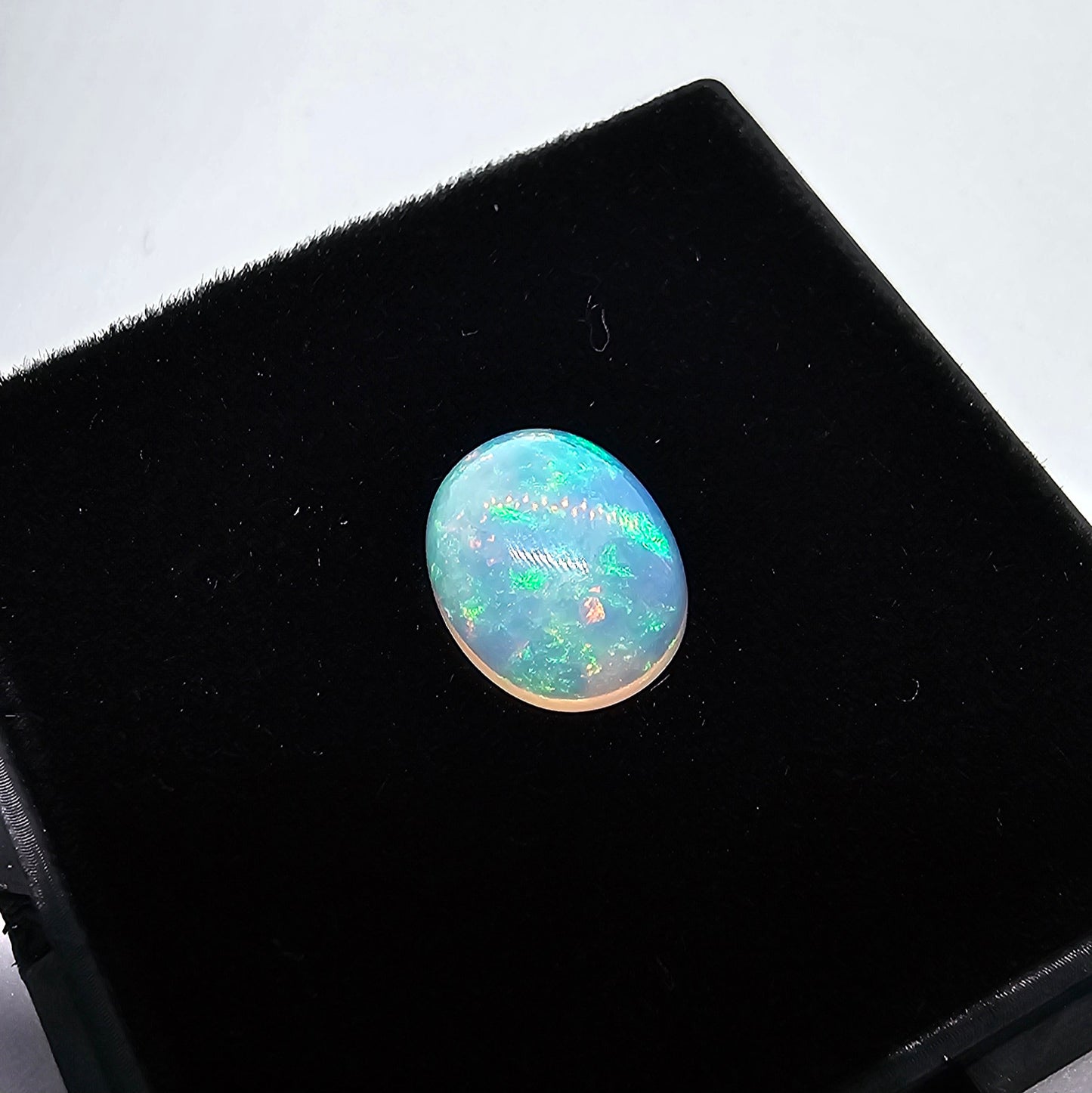 2.1 ct Oval White Opal, 10 x 8 mm