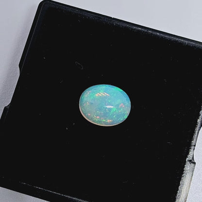 2.1 ct Oval White Opal, 10 x 8 mm