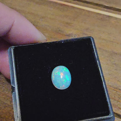 2.1 ct Oval White Opal, 10 x 8 mm
